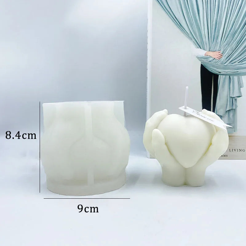 Hands Holding Heart Candle Mold